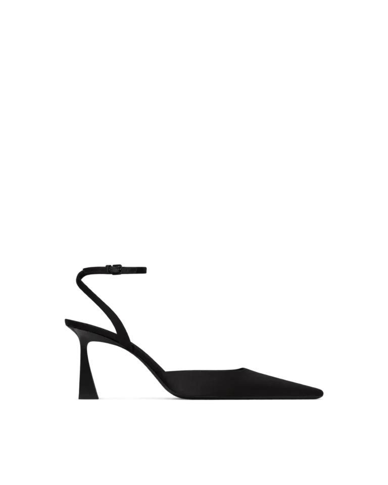 Black pointed-toe slingback pump with a slim buckled ankle strap, side profile