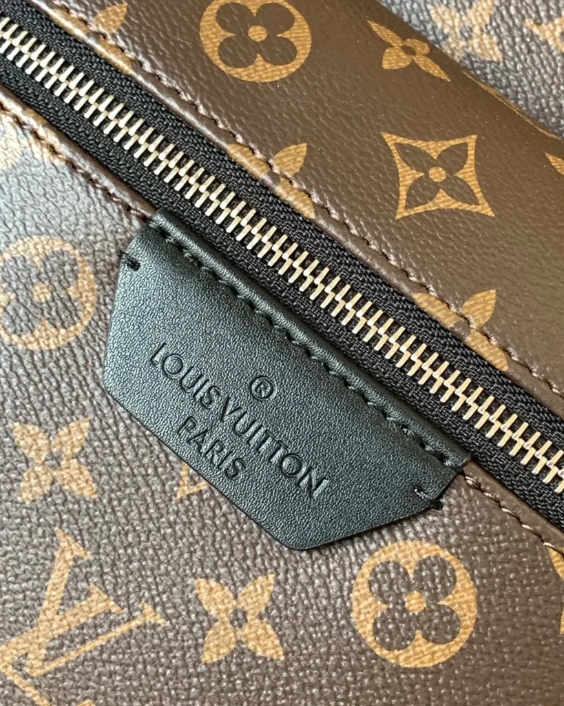 Brown Monogram Discovery-Inspired Backpack — front pocket detail view