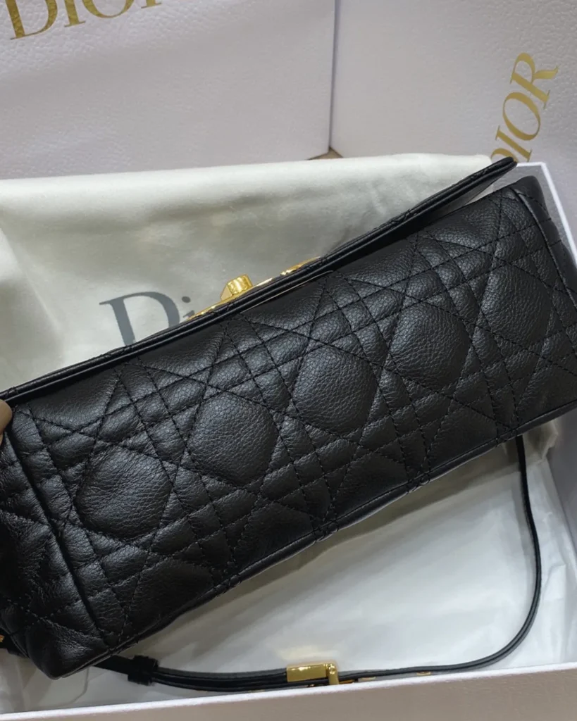 Black Quilted Flap Bag with Gold Tone Clasp — base view