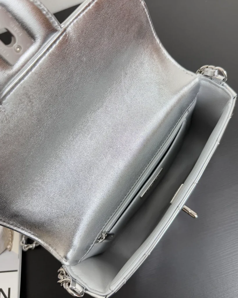 Metallic Silver Quilted Top-Handle Flap Bag — open interior view