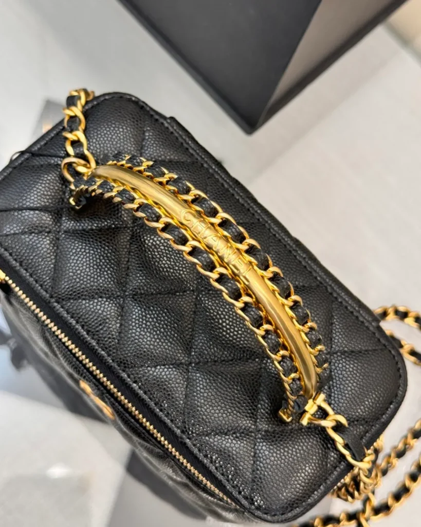 Black Quilted Chain-Handle Vanity Bag — top view