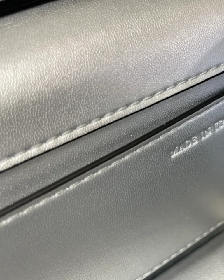Silver Scale-Pattern Top-Handle Flap Bag — interior detail view