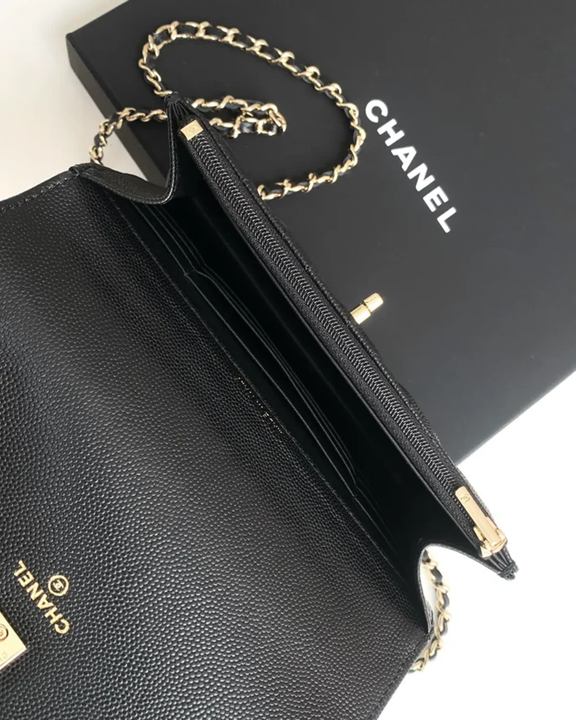 Black Quilted Top-Handle Chain Clutch — interior view