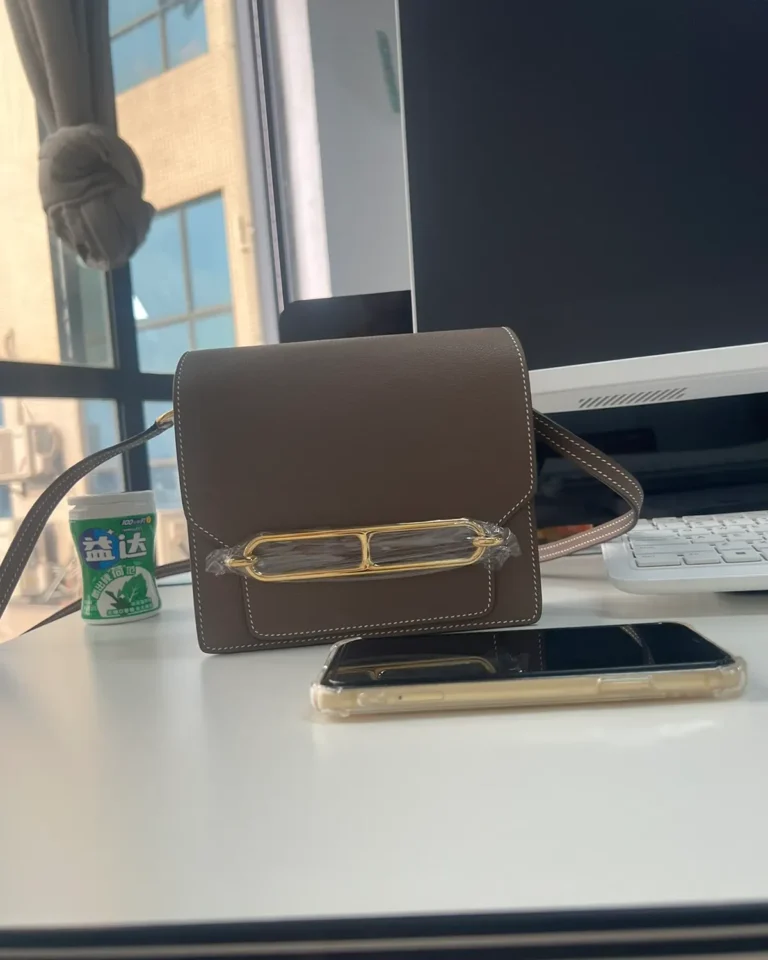 Taupe Link-Clasp Shoulder Bag — front context view