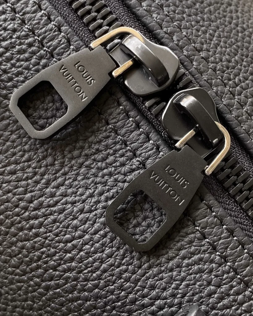 Black Grained-Look Duffle Bag — zipper detail view