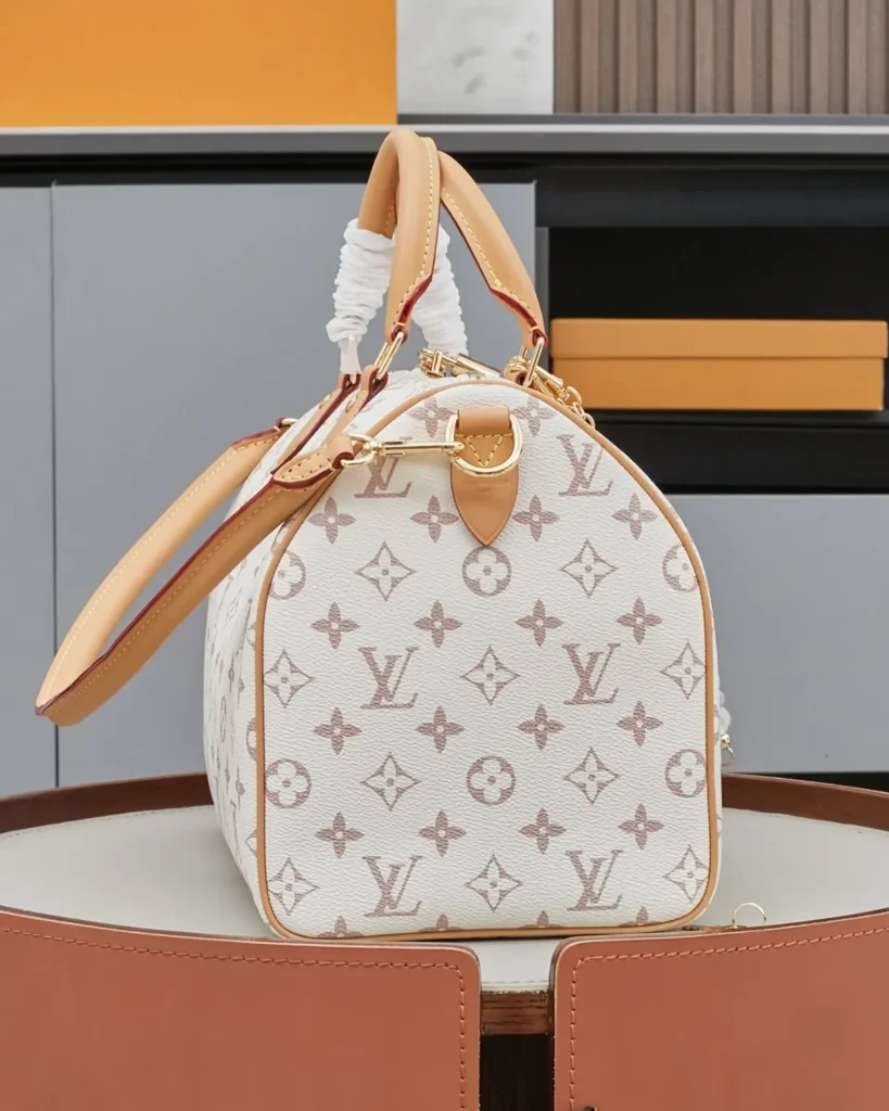 Cream Monogram Top-Handle Bag with Colorful Charms — side view