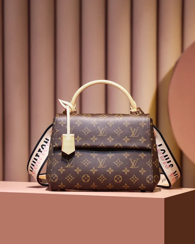 Brown Monogram Structured Top-Handle Bag — front handle view