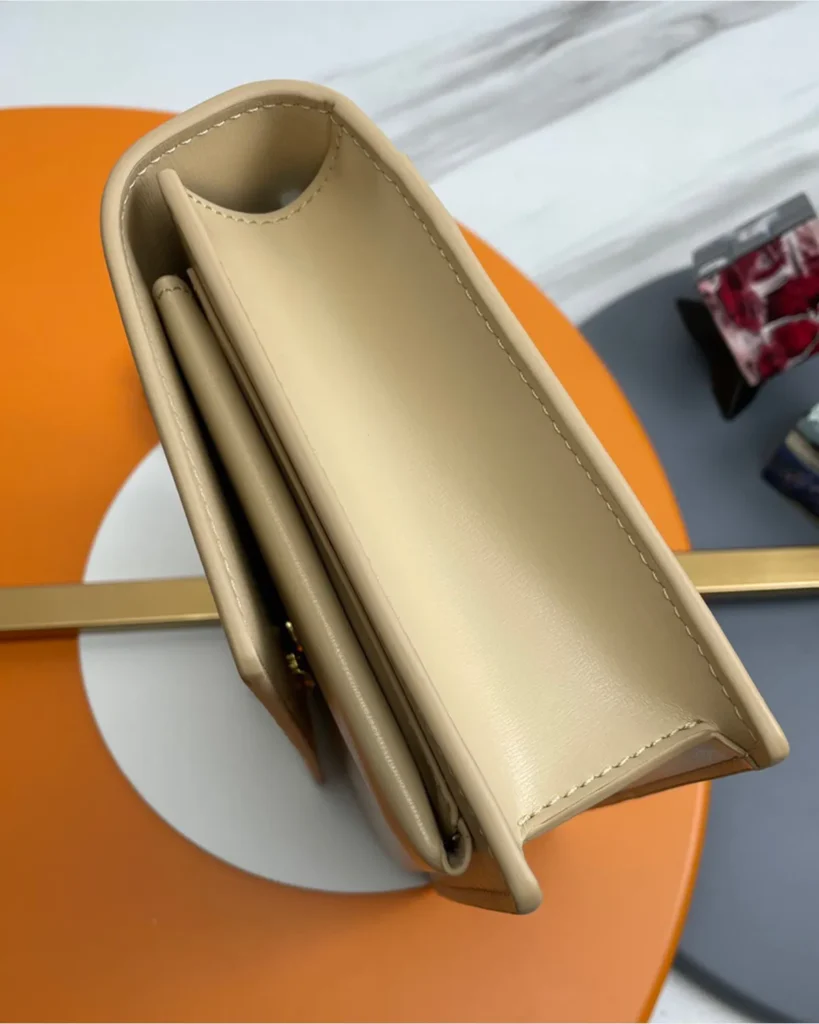 Cream Top-Handle Accordion Flap Bag — side view