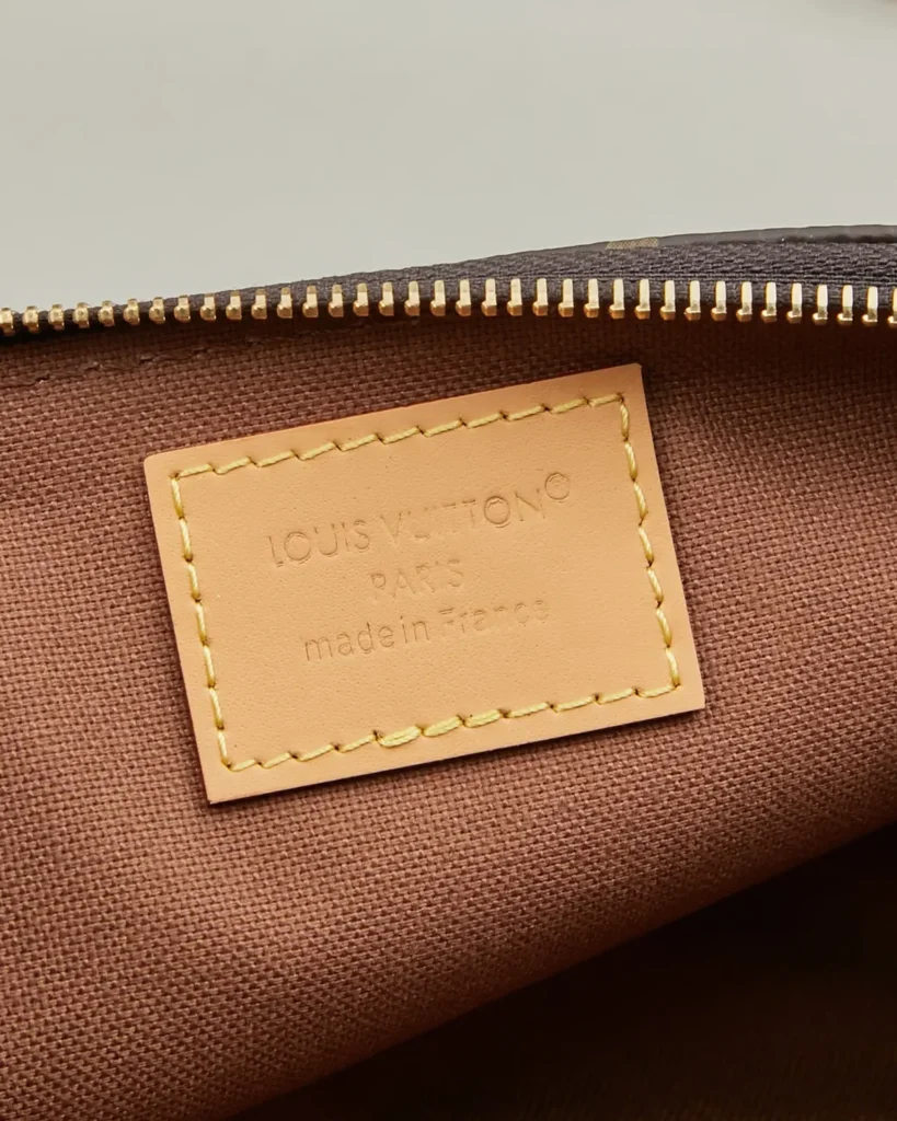 Brown Monogram Gold-Plate Chain Clutch — interior label view
