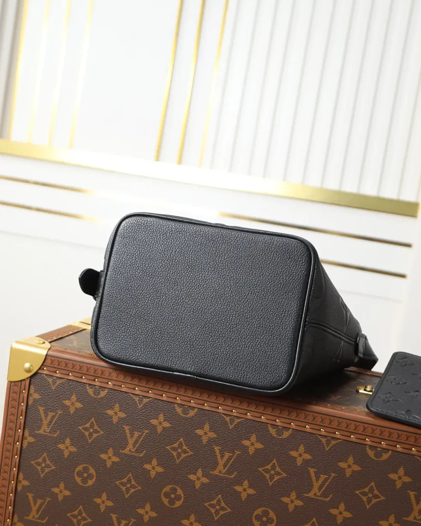 Black Embossed Monogram Bucket Bag — base view