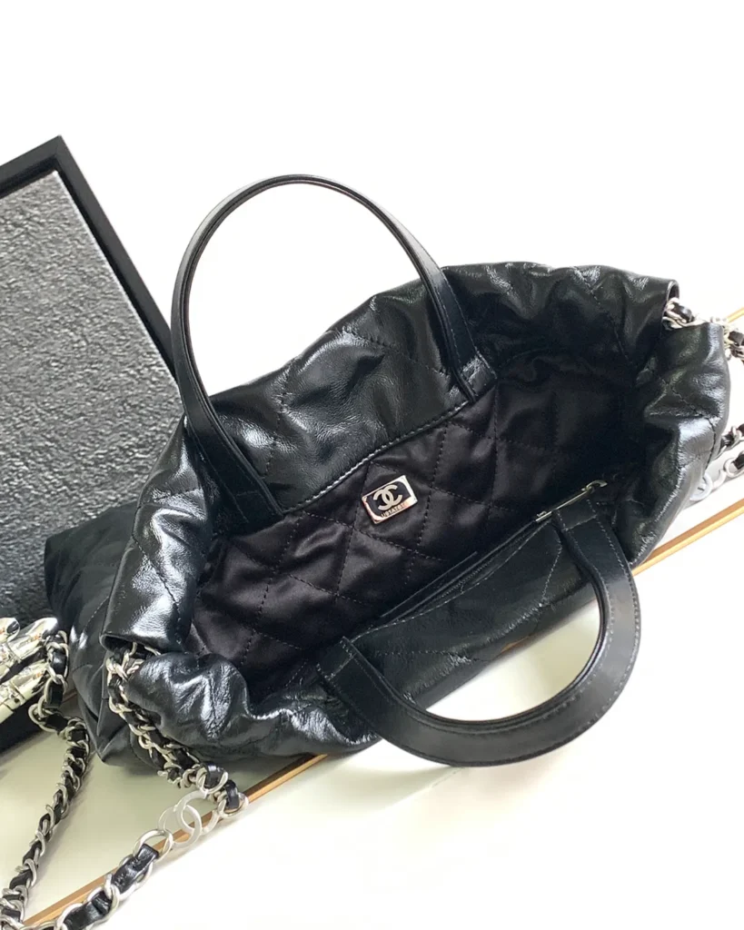 Glossy Black Quilted Gathered Tote — open top view