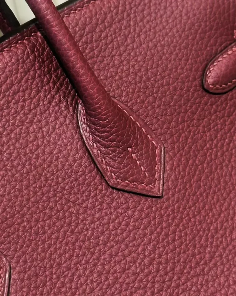 Burgundy Grained Top-Handle Bag — handle base view