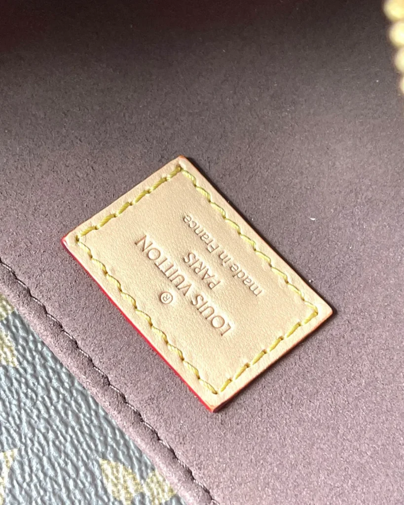 Brown Monogram East West Chain Satchel — interior label view
