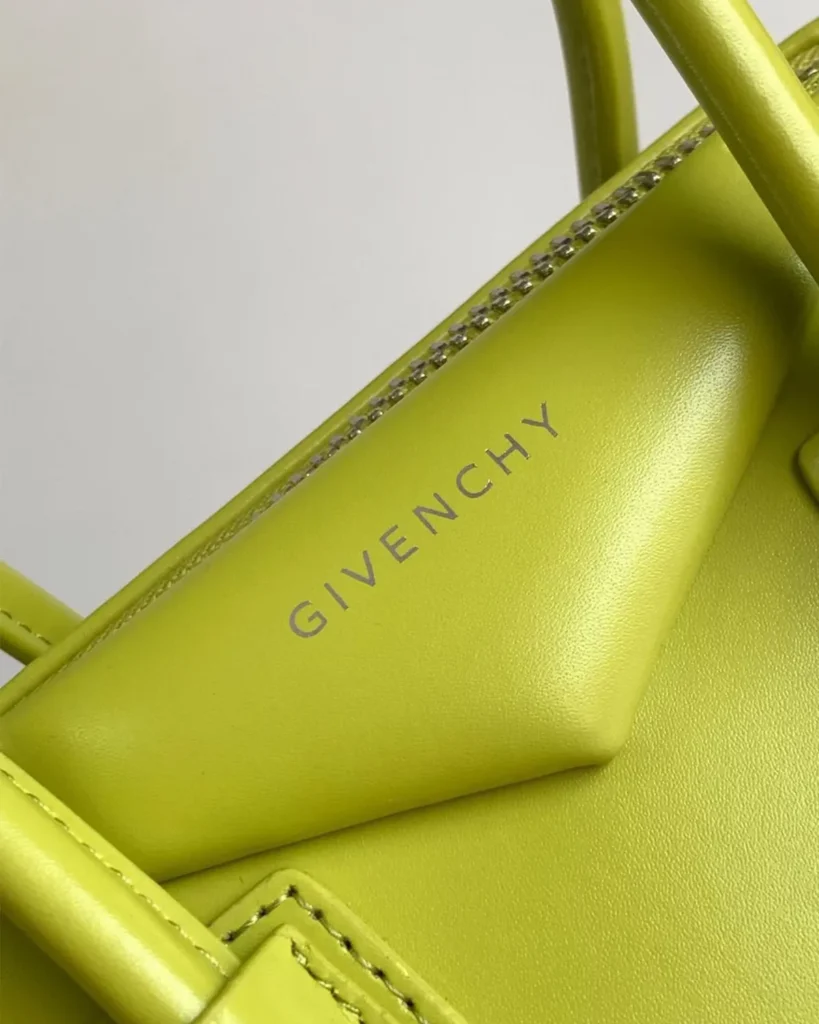 Lime Green Architectural Top Handle Bag — logo detail view