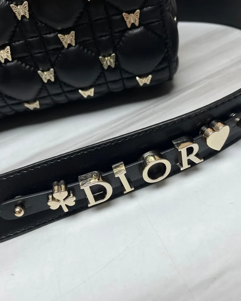 Black Butterfly-Embellished Top Handle Bag — strap detail view