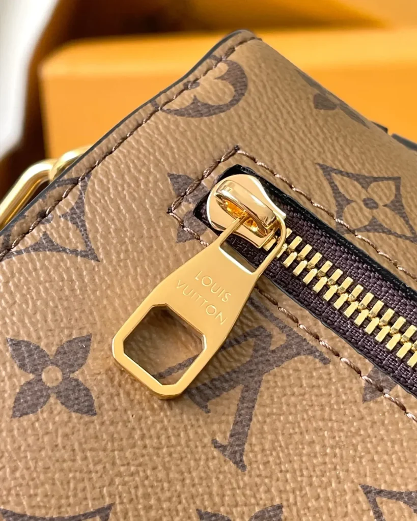 Two-Tone Monogram Envelope Satchel — rear zipper view