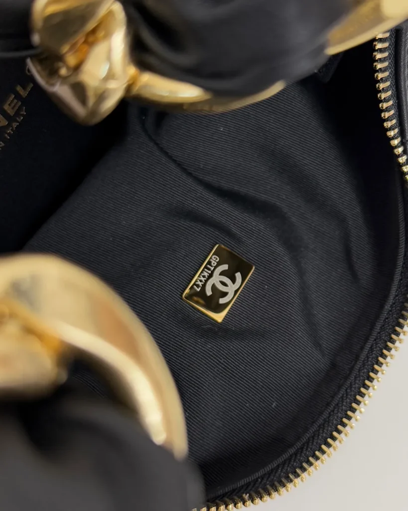 Black Quilted Chunky-Chain Hobo Bag — interior view
