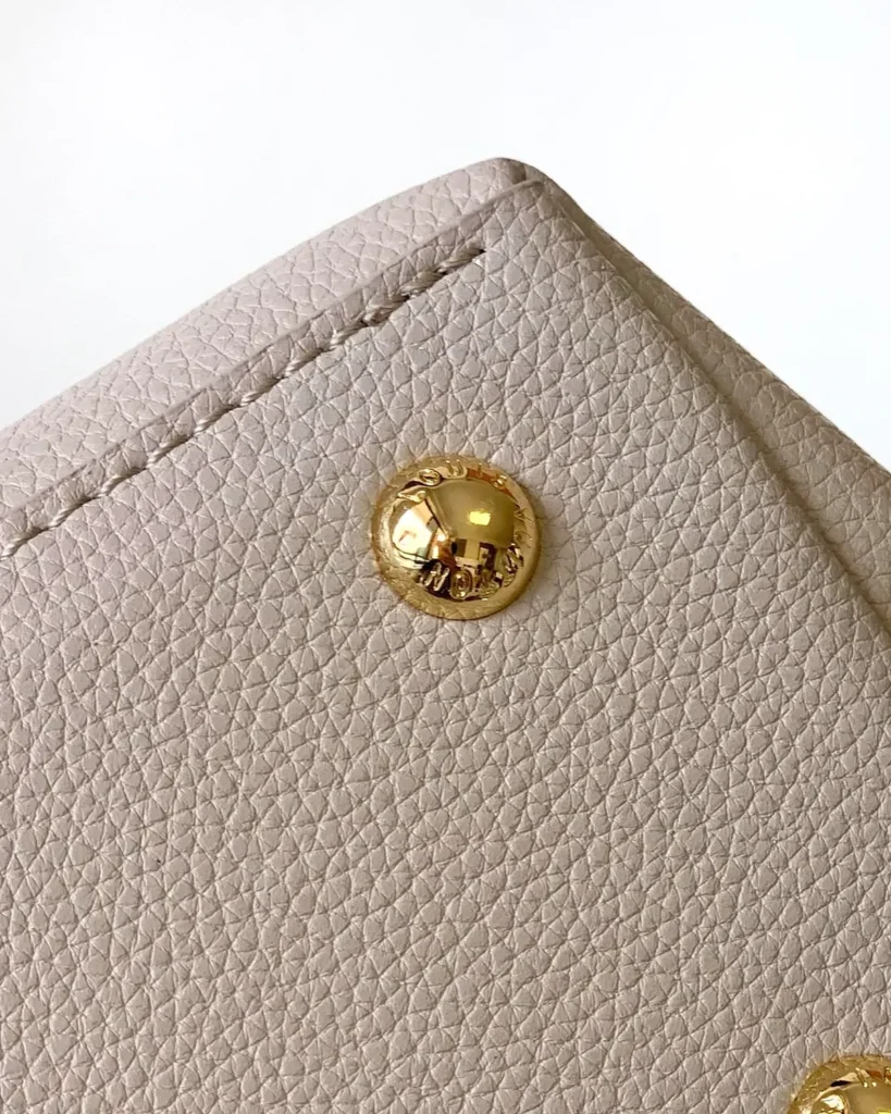 Greige Lockme Ever-Inspired Mini Handbag — corner foot detail view