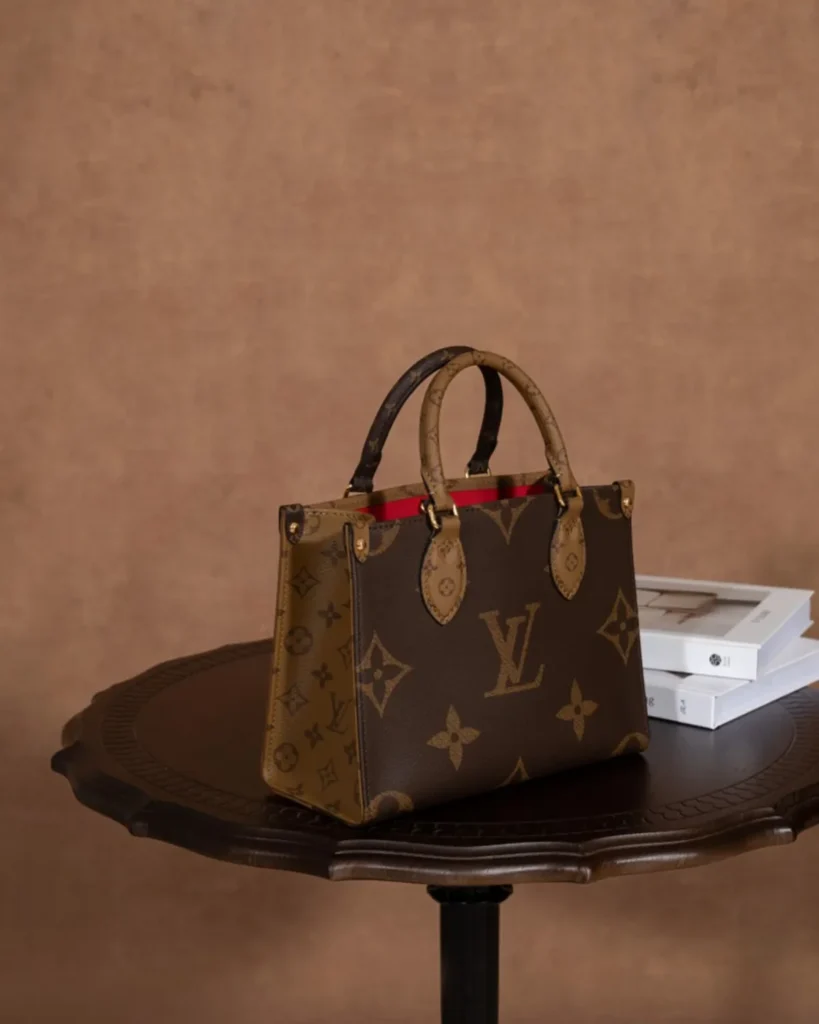 Brown Giant Monogram Tote with Round Pouch — three quarter view