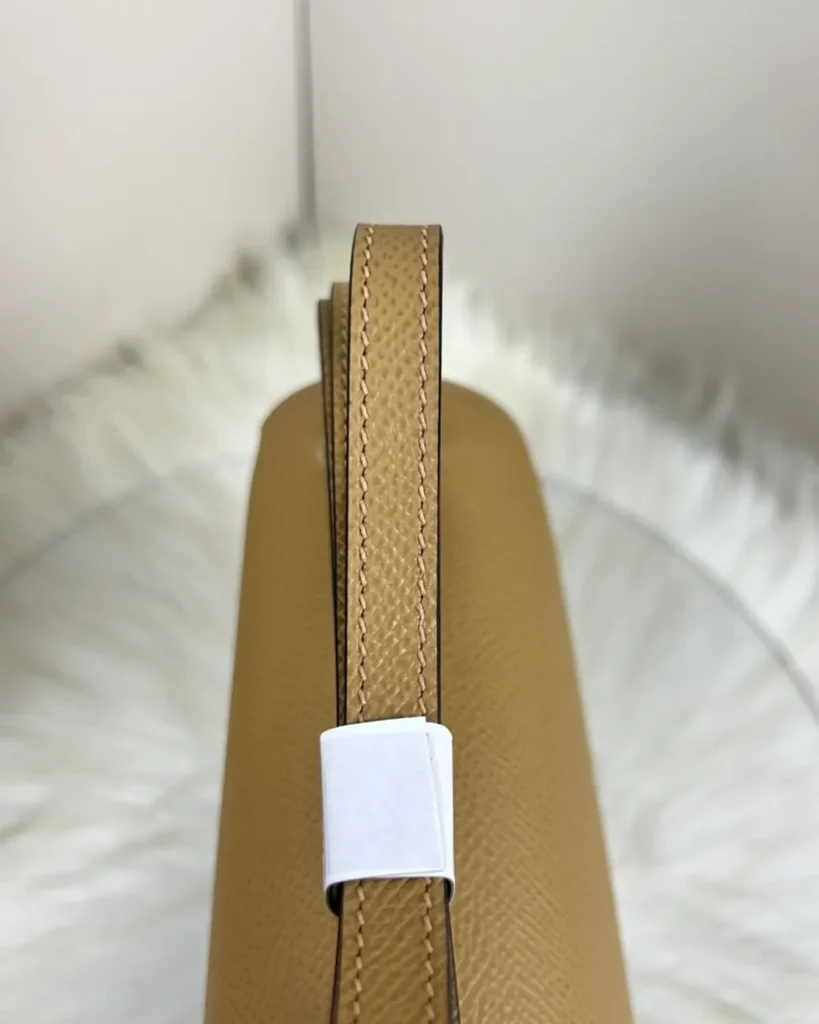 Kraft Tan constance-inspired mini 18 bag, strap detail view