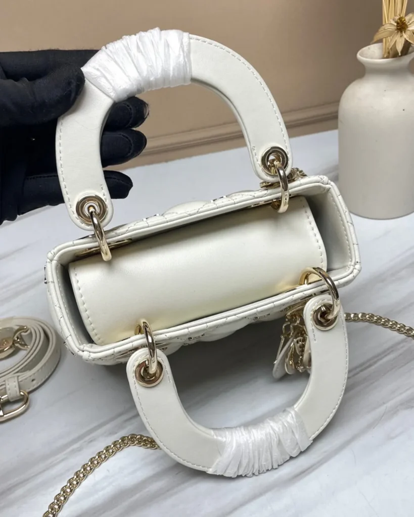 Ivory Butterfly Stud Quilted Top Handle Bag — top view
