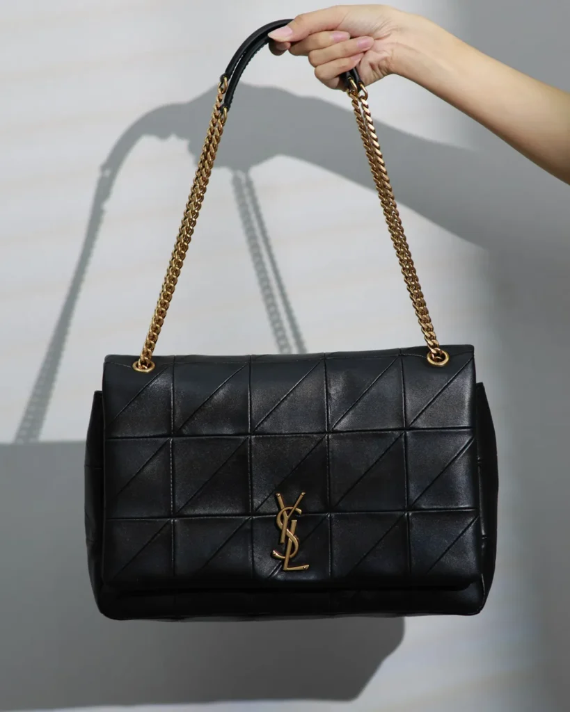 Black Geometric Quilted Flap Bag — front view