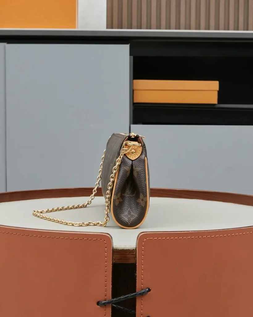 Brown Monogram Gold-Plate Chain Clutch — side view
