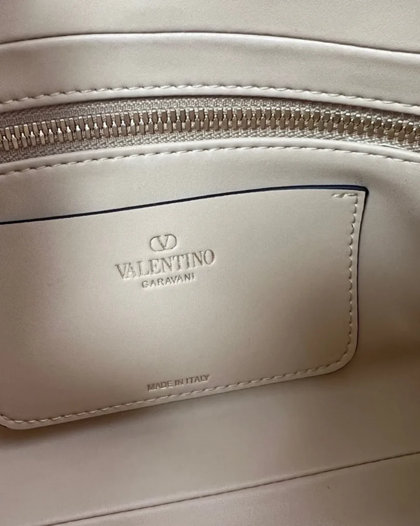 Beige Chevron Zip-Top Chain Bag — interior label view