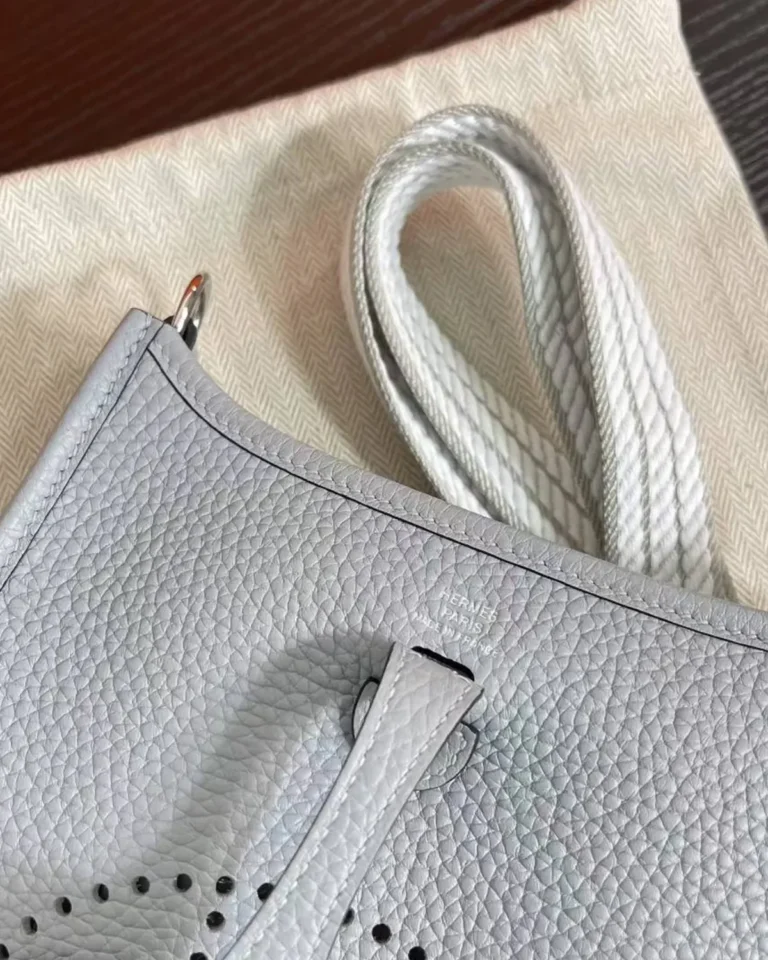 Evelyne-Inspired Mini Flax Blue Crossbody Bag, front texture and fastening tab