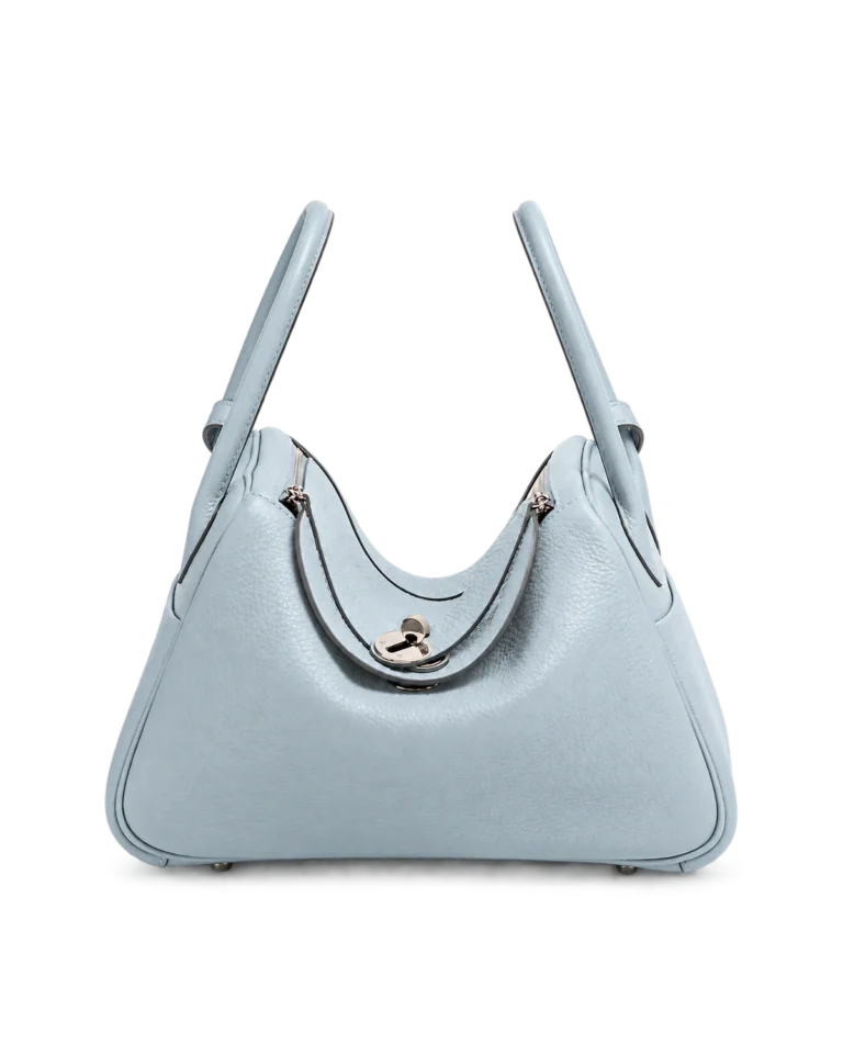 Upright front view of an ice-blue soft leather shoulder bag with an open U-shaped top and silver-tone hardware