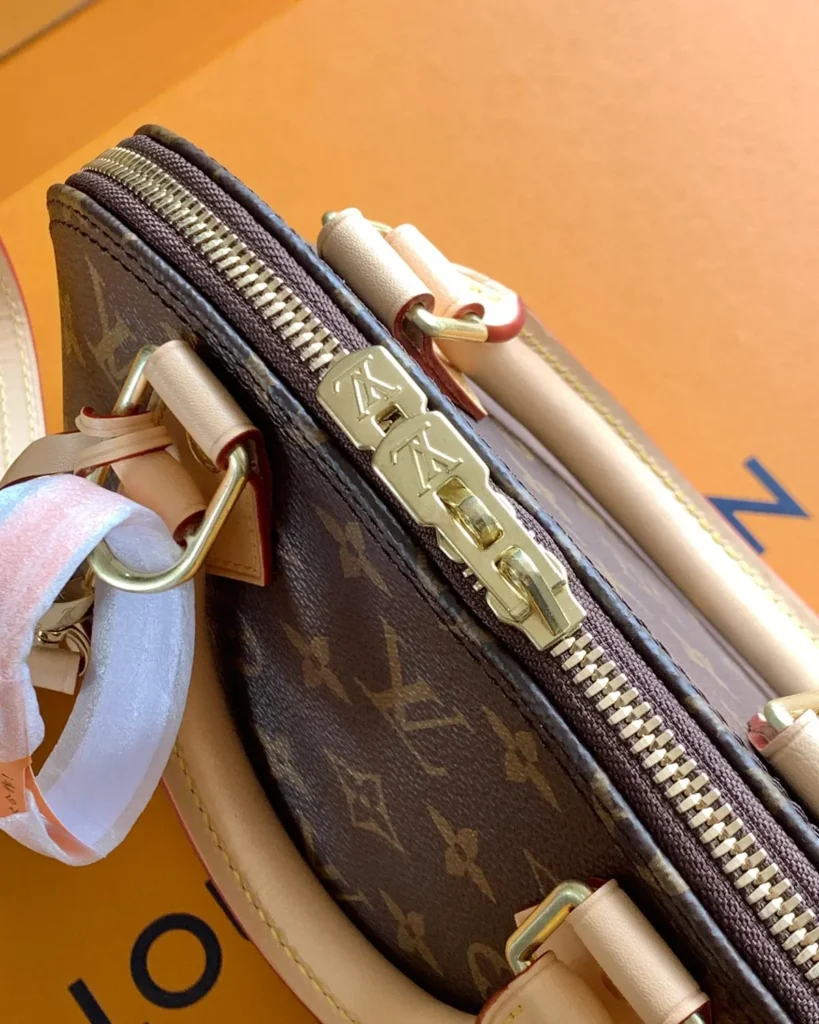 Brown Monogram Dome Satchel with Pale Trim — zipper view
