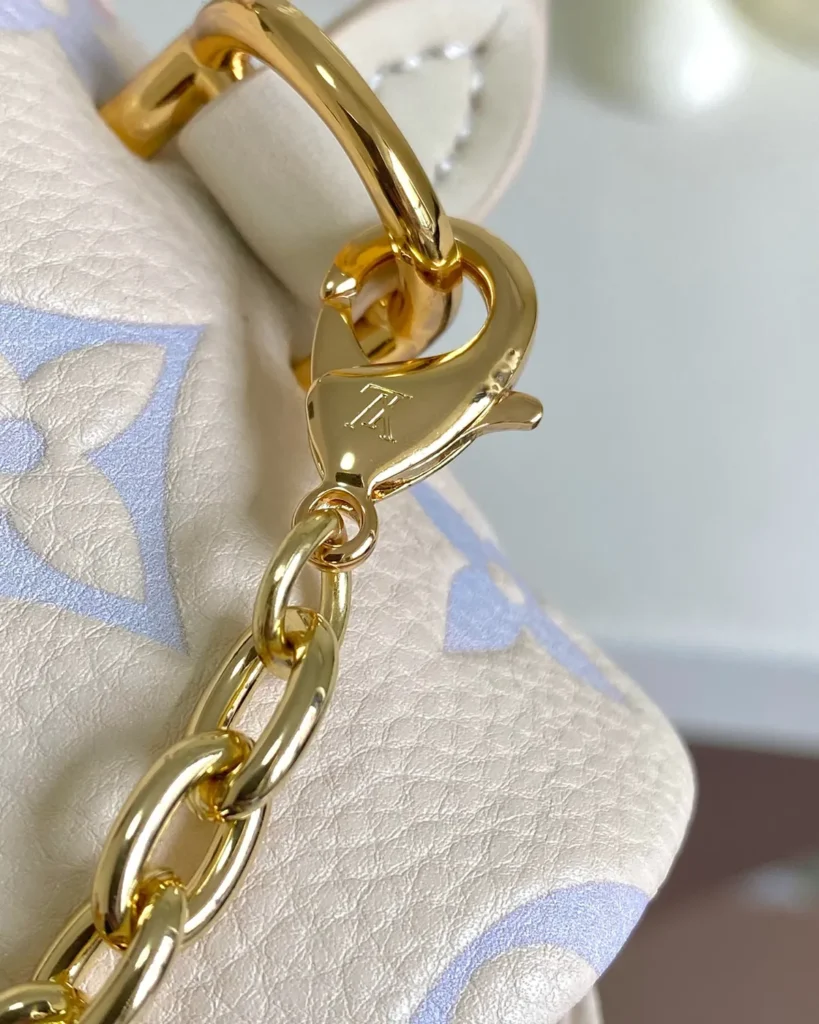 Cream Pastel Monogram Top Handle Bag — chain clip view