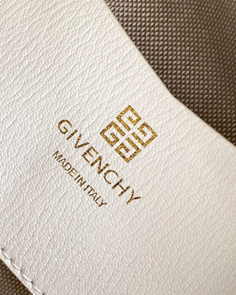 White Domed Top Handle Bag — interior label view