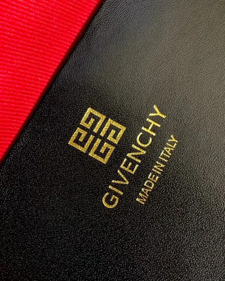 Black Red-Lined Twin-Handle Satchel — label detail