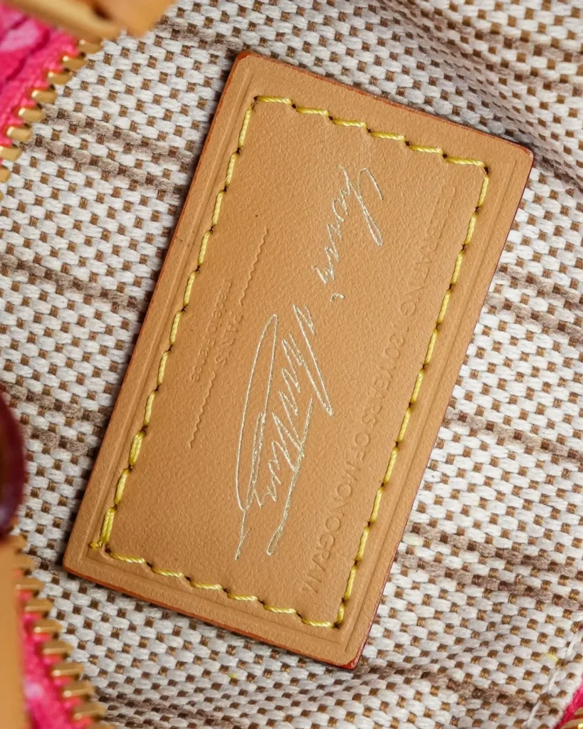 Pink Monogram Mini Duffle Bag — interior label view