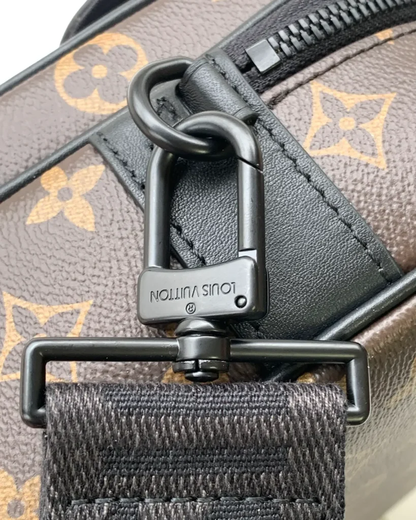 Brown Monogram Black-Trim Messenger Bag — strap clasp view