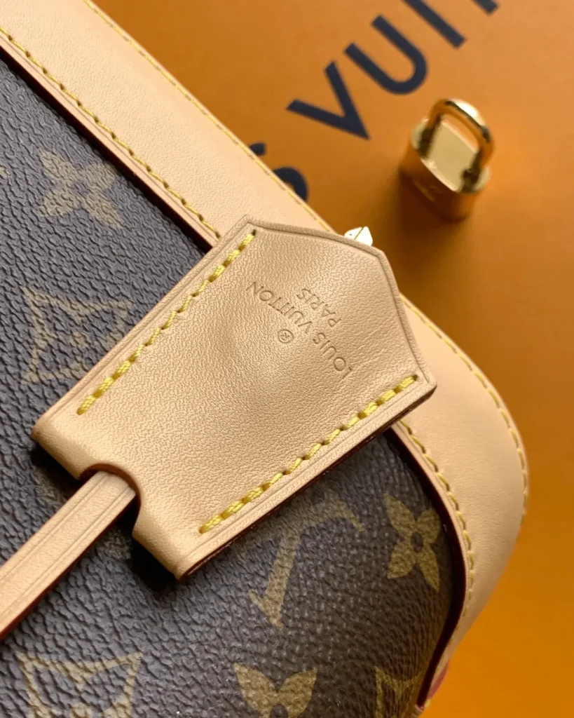 Brown Monogram Dome Satchel with Pale Trim — tag detail view