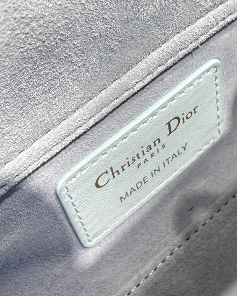 Soft Blue Quilted Chain Handbag — interior label view