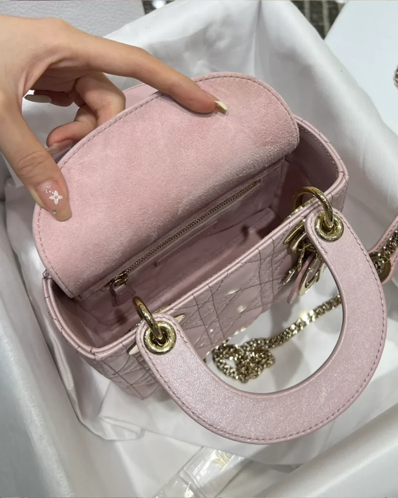 Pearlescent Pink Quilted Top Handle Bag — open top view