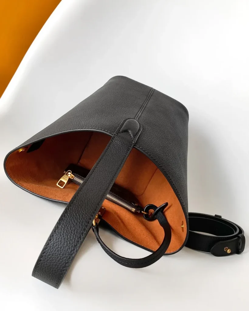 Black Curved Top Bucket Bag with Padlock — interior view