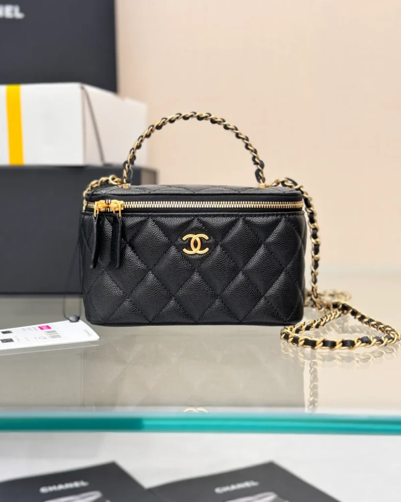 Black Quilted Chain-Handle Vanity Bag — front view