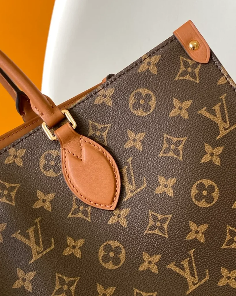 Brown Monogram Tall Tote — handle detail view