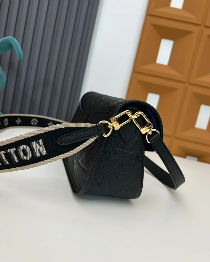 Black Embossed-Monogram Buckle Satchel — side view