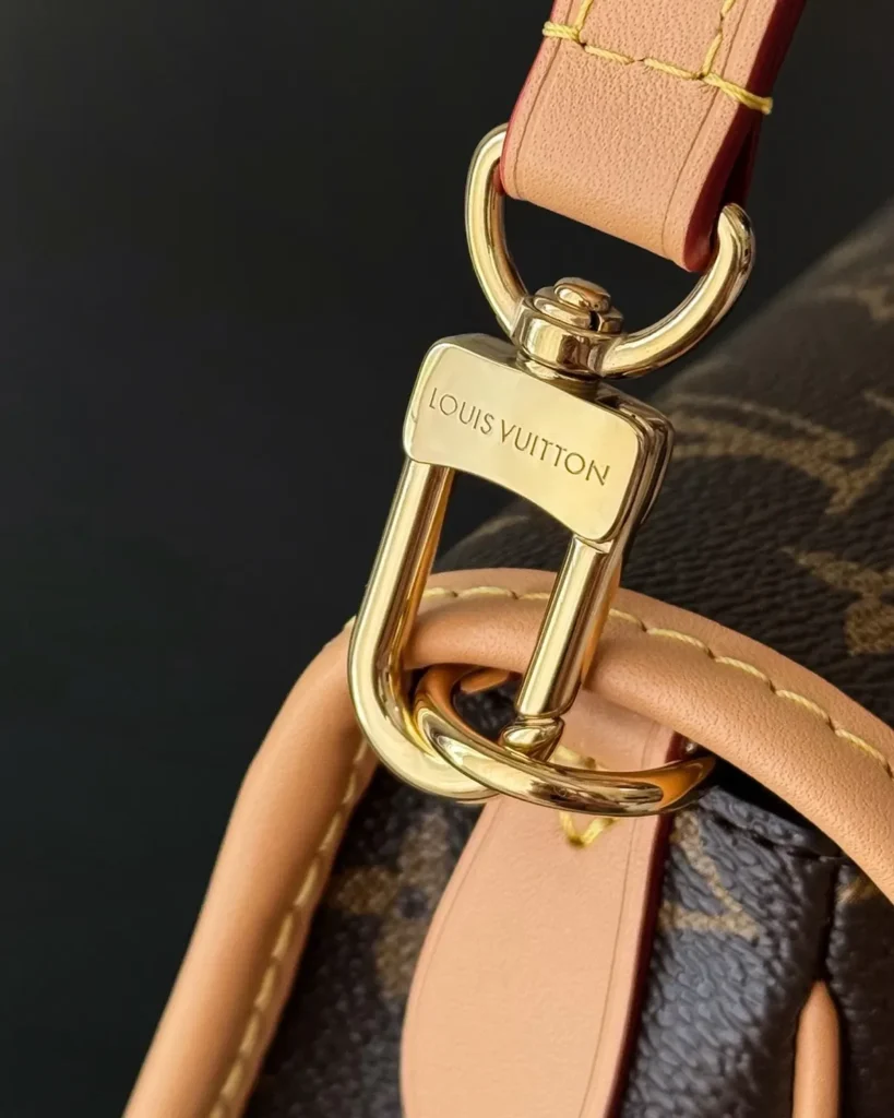 Brown Monogram Buckle Satchel — strap clasp view