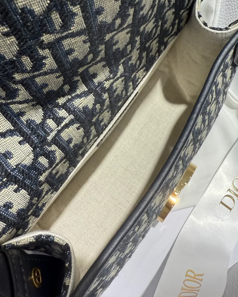 Navy Monogram Saddle Shoulder Bag — open interior view