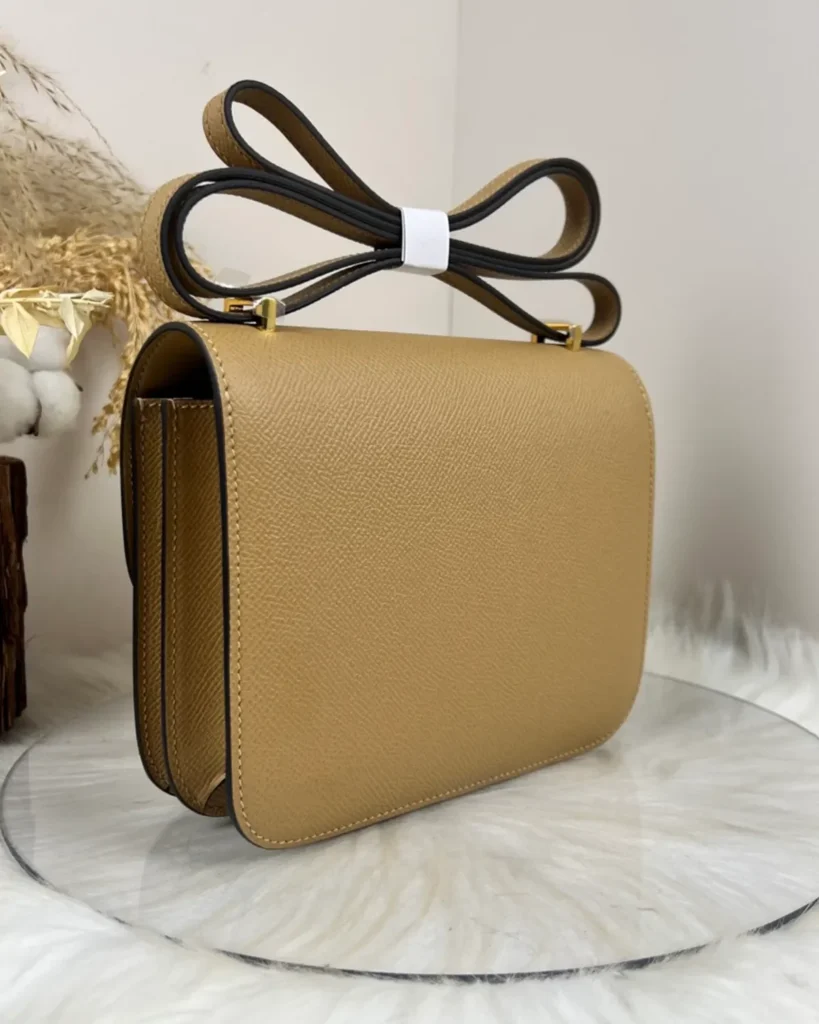Kraft Tan constance-inspired mini 18 bag, back angle view