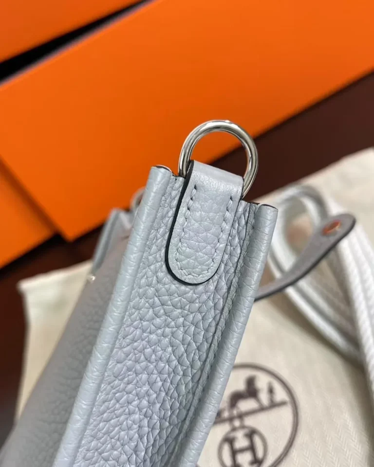 Evelyne-Inspired Mini Flax Blue Crossbody Bag, side strap ring close-up