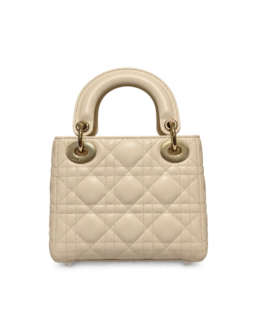 Cream Quilted Top Handle Bag with Sparkling Charms — rear view