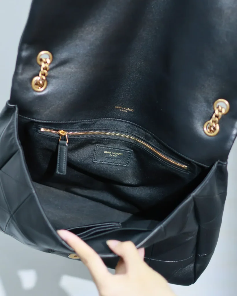 Black Geometric Quilted Flap Bag — interior view