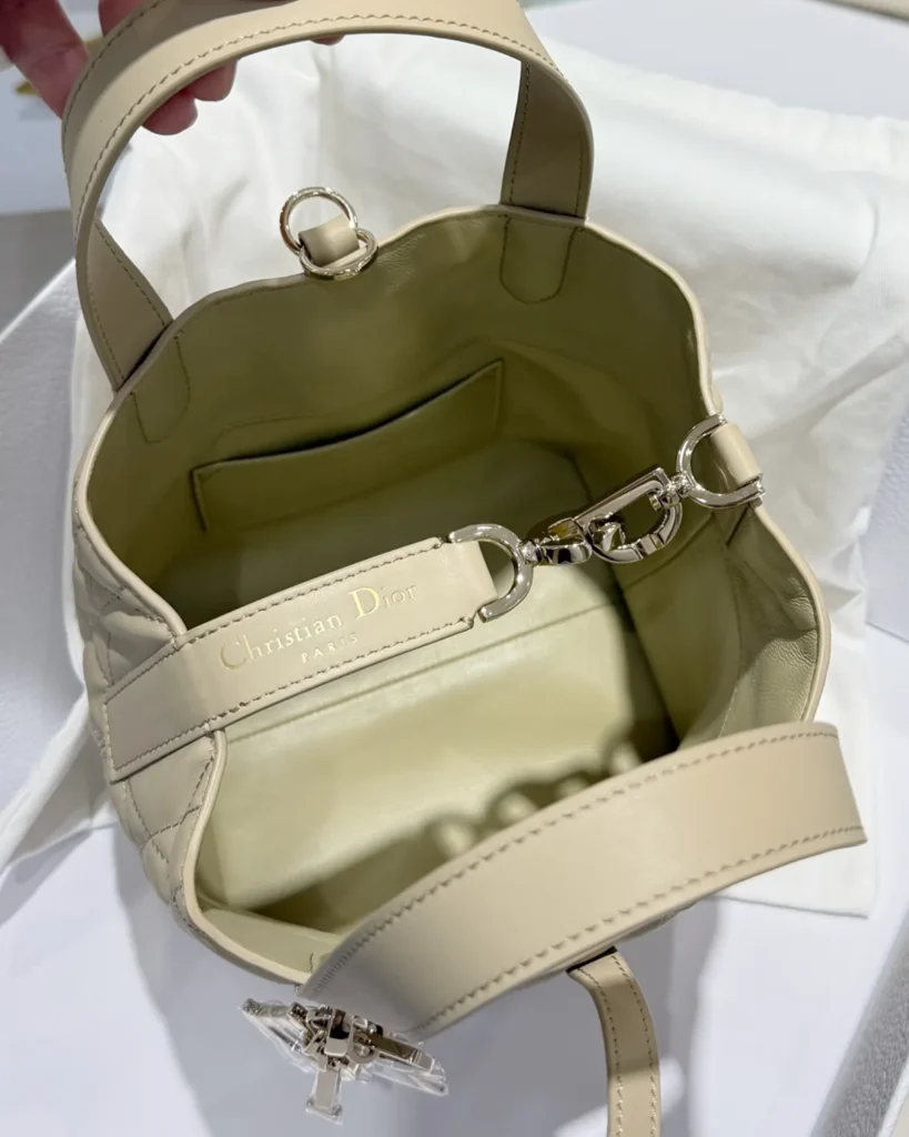 Sage Beige Vertical Quilted Tote — interior pouch view